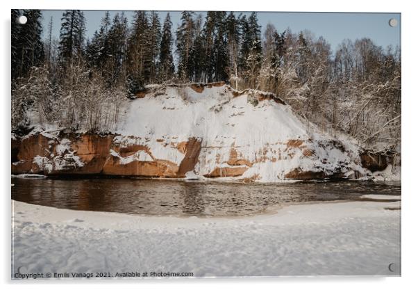 rock cliff and cave by the river Gauja in the Gauja National Park in Latvia in winter with beautiful sun through the forest Acrylic by Emils Vanags