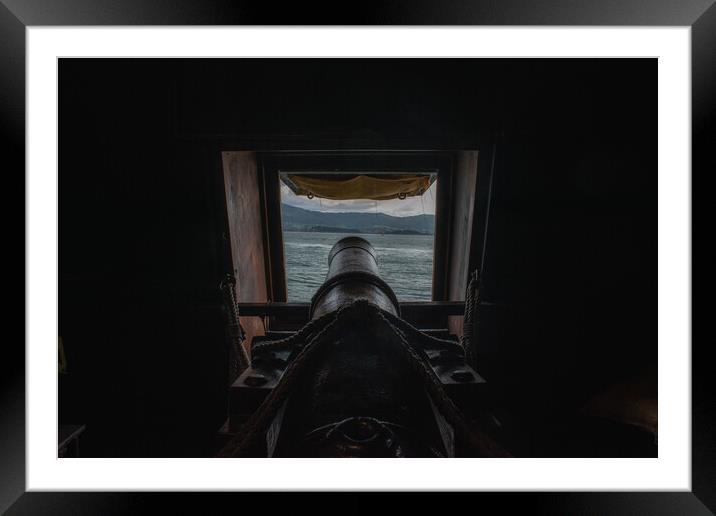 cannon inside a Spanish galleon aiming at enemies Framed Mounted Print by David Galindo