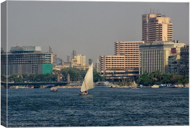 Arab Dhow sailing vessel on the River Nile, Cairo, Egypt. Canvas Print by Peter Bolton
