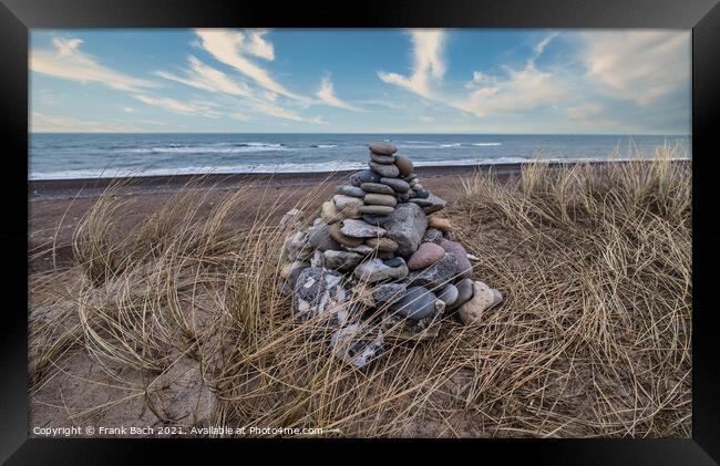 Stone cairn at Lildstrand beach in western rural Denmark Framed Print by Frank Bach