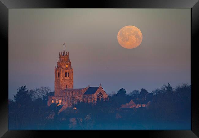 Snow Moon (or Hunger Moon) setting behind St Andrew's Church, Su Framed Print by Andrew Sharpe