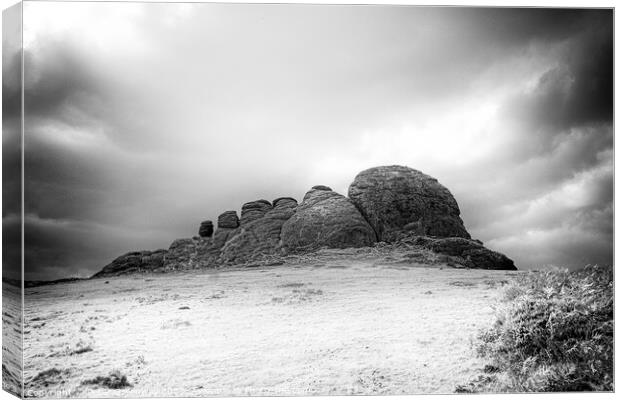 The Iconic Heytor Tor on Dartmoor In Infrared Canvas Print by Peter Greenway