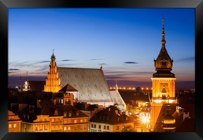 Old Town of Warsaw at Twilight in Poland Framed Print by Artur Bogacki