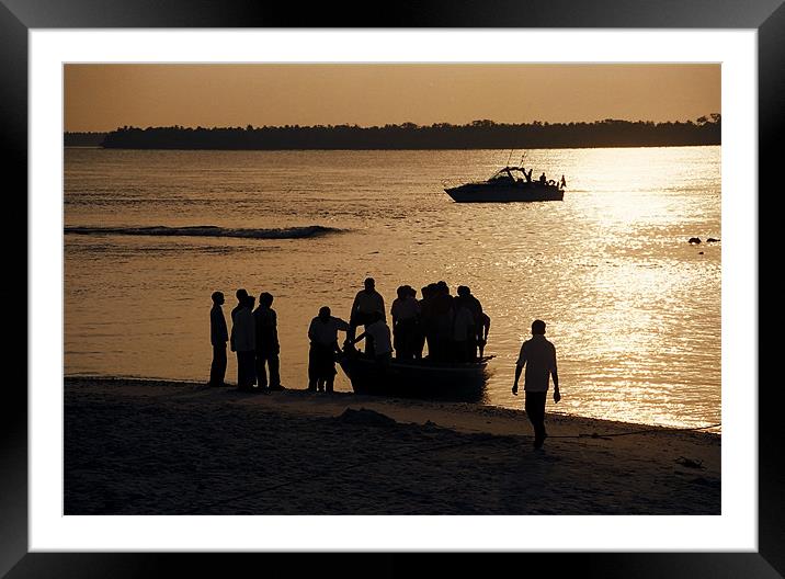 boat arriving Framed Mounted Print by Hassan Najmy