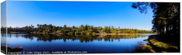 Lake reflections panorama Canvas Print by Colin Chipp