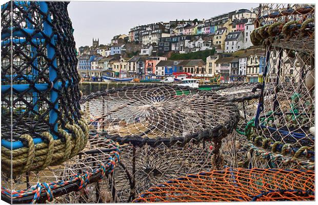 Brixham Lobster Pots Canvas Print by kevin wise