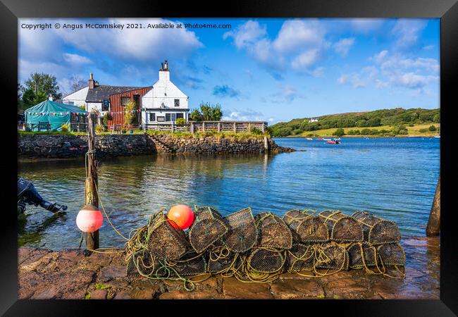 Lobster pots and floats on Badachro jetty Framed Print by Angus McComiskey