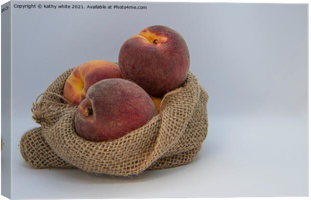 Peaches, ripe in a hessian bag,fresh fruit, Canvas Print by kathy white