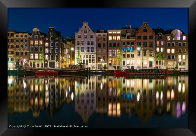 Reflection of the buildings along the canal at night in Amsterdam, Netherlands Framed Print by Chun Ju Wu