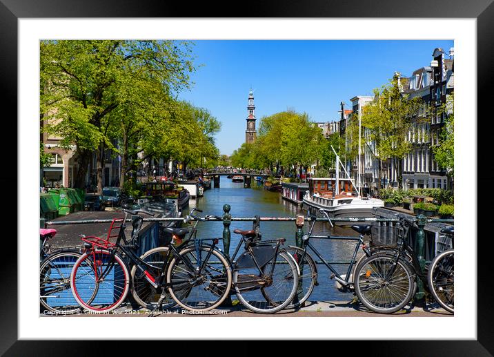 Bikes on the bridge that crosses the canal in Amsterdam, Netherlands Framed Mounted Print by Chun Ju Wu