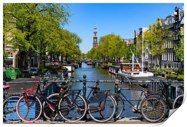 Bikes on the bridge that crosses the canal in Amsterdam, Netherlands Print by Chun Ju Wu