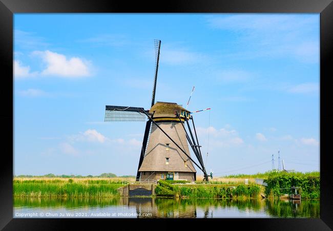 The windmills in Kinderdijk, a UNESCO World Heritage site in Rotterdam, Netherlands Framed Print by Chun Ju Wu