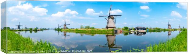 Panorama of the windmills and the reflection on water in Kinderdijk, a UNESCO World Heritage site in Rotterdam, Netherlands Canvas Print by Chun Ju Wu