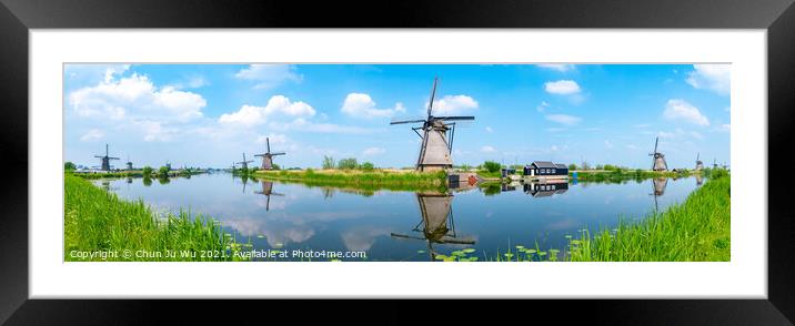 Panorama of the windmills and the reflection on water in Kinderdijk, a UNESCO World Heritage site in Rotterdam, Netherlands Framed Mounted Print by Chun Ju Wu
