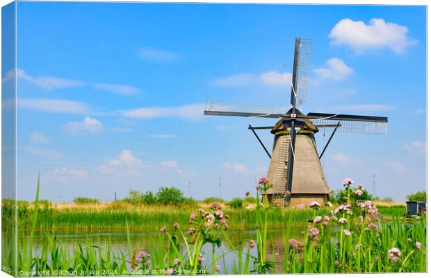 The windmills in Kinderdijk, a UNESCO World Heritage site in Rotterdam, Netherlands Canvas Print by Chun Ju Wu
