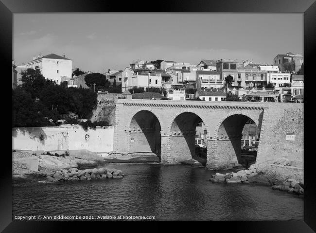 Bridge on the coast of Marseille in monochrome Framed Print by Ann Biddlecombe