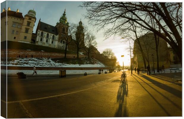 Krakow, Poland - Road to the main entrance to royal Wawel Castle in Cracow and bicycle parked against sunset Canvas Print by Arpan Bhatia