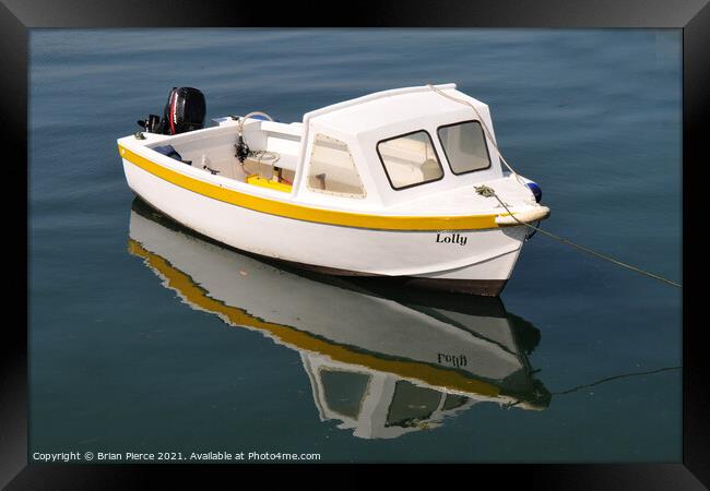 Boat and its reflection  Framed Print by Brian Pierce