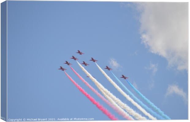 The red arrows at clacton on Sea air show  Canvas Print by Michael bryant Tiptopimage