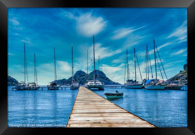 Bay with boats on a jetty artwork Framed Print by Travel and Pixels 