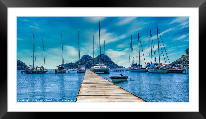 Bay with boats on a jetty Framed Mounted Print by Stuart Chard