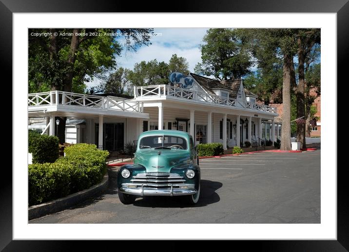 Classic Chevrolet outside vintage motel Framed Mounted Print by Adrian Beese