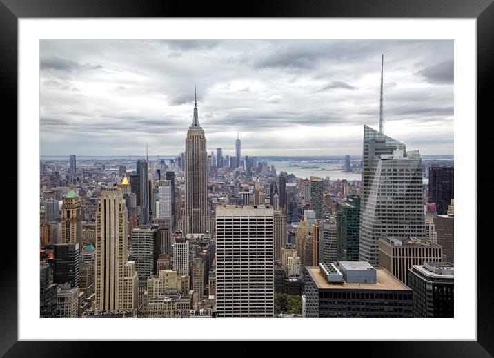 Manhattan and the Empire State Building Framed Mounted Print by Jon Jones