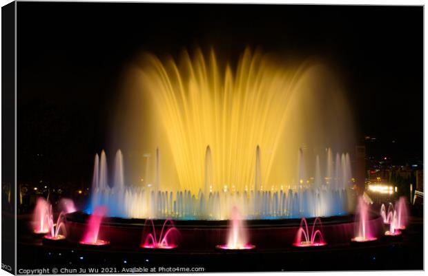 The colorful water show of Magic Fountain of Montjuic with light and music in Barcelona , Spain Canvas Print by Chun Ju Wu