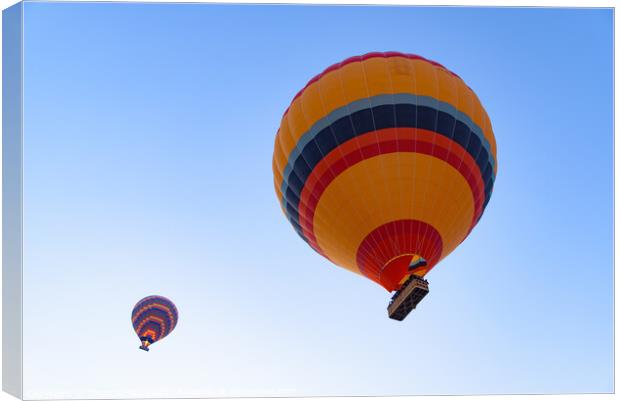 Flying hot air balloons in the sky in Goreme, Cappadocia, Turkey Canvas Print by Chun Ju Wu