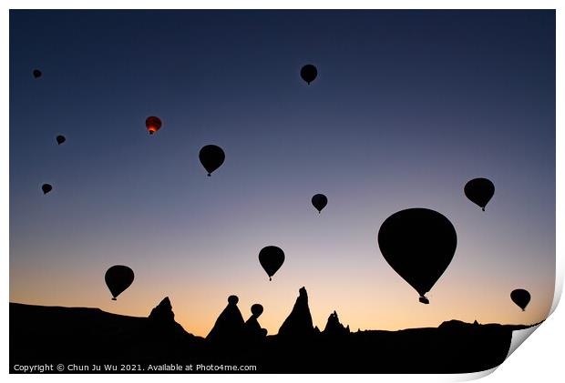 Silhouette of flying hot air balloons and rock landscape at sunrise time in Goreme, Cappadocia, Turkey Print by Chun Ju Wu
