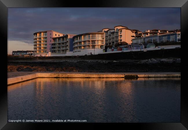Westward Ho! seaside apartments at sunset Framed Print by James Moore