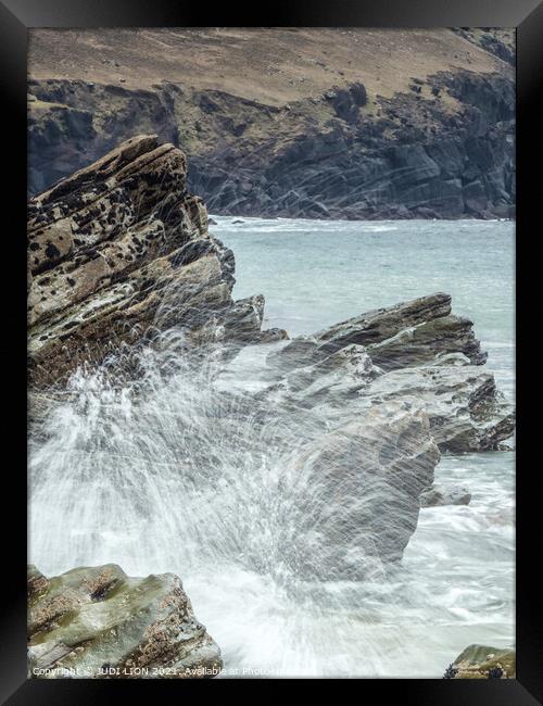 Wave crashing on rock Framed Print by JUDI LION