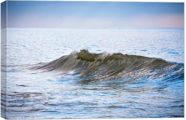 A Wave at Sunset Canvas Print by Heidi Stewart