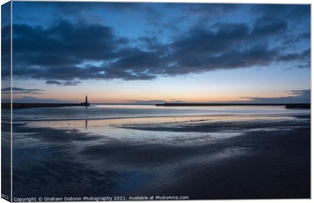 Roker Pier and Lighthouse, at ‘Blue Hour’ Canvas Print by Graham Dobson