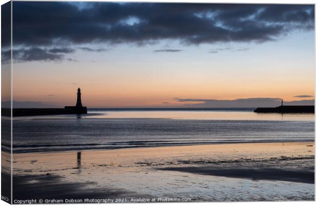 Roker Pier and Lighthouse at Sunrise  Canvas Print by Graham Dobson