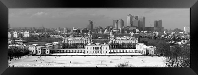 Snow bound panoramic view of the Isle of Dogs Gree Framed Print by Terry Senior