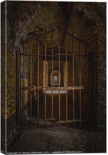 Abandoned prison door Canvas Print by Steven Dijkshoorn