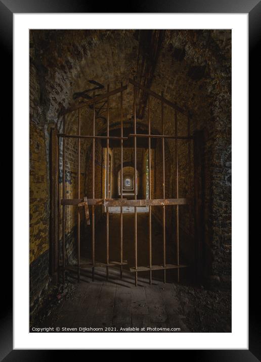 Abandoned prison door Framed Mounted Print by Steven Dijkshoorn