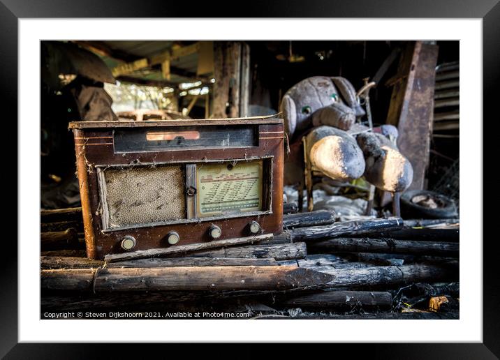 A vintage radio with an elephant plush toy Framed Mounted Print by Steven Dijkshoorn