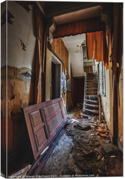 An old deserted corridor in a small house Canvas Print by Steven Dijkshoorn