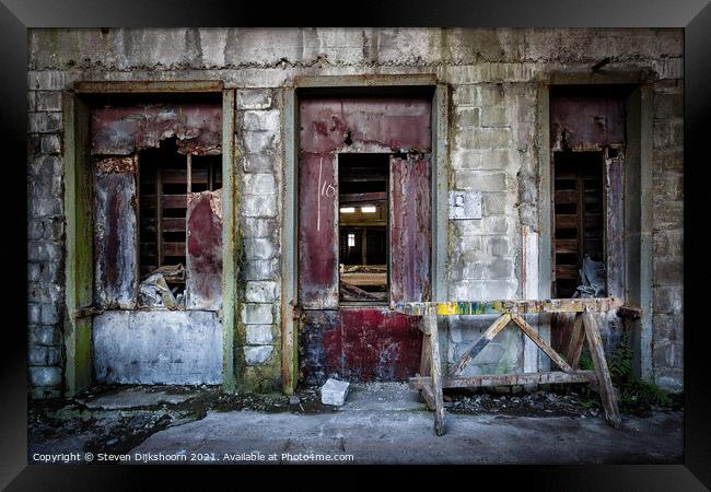 The three red doors in an abandoned factory Framed Print by Steven Dijkshoorn