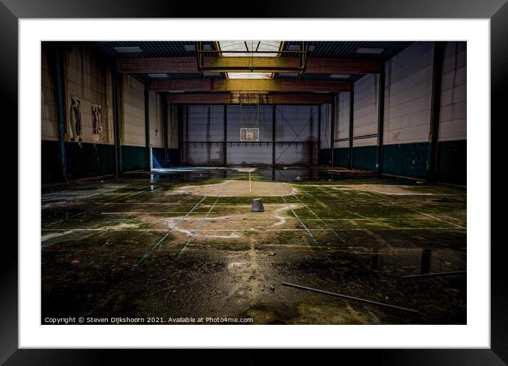 An old and abandoned basketball court Framed Mounted Print by Steven Dijkshoorn