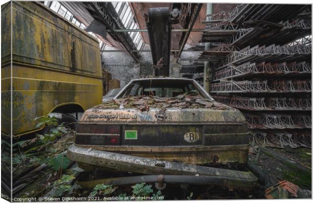 An old and abandoned car Canvas Print by Steven Dijkshoorn