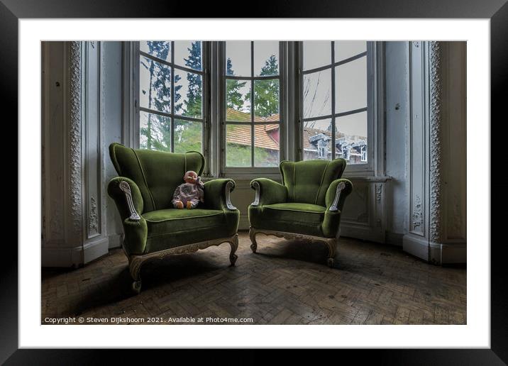 Old green chairs with an doll on it Framed Mounted Print by Steven Dijkshoorn