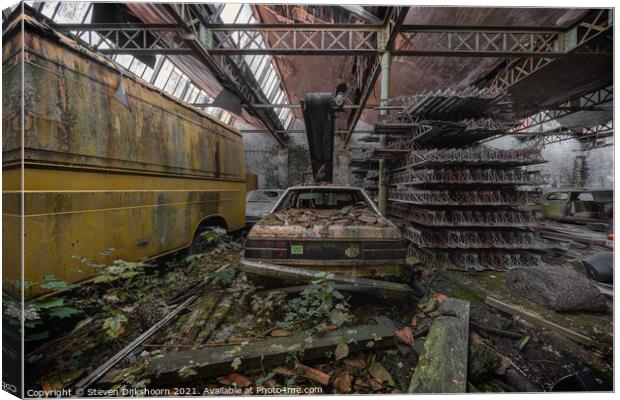 An old car in an abandoned space Canvas Print by Steven Dijkshoorn