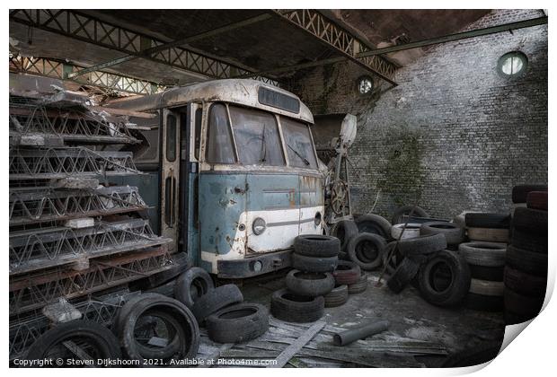 An old blue bus with tires surrounded Print by Steven Dijkshoorn