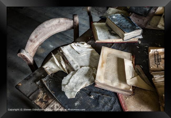 A table with old books on it Framed Print by Steven Dijkshoorn