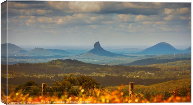 The Glasshouse Mountains Canvas Print by Pete Evans