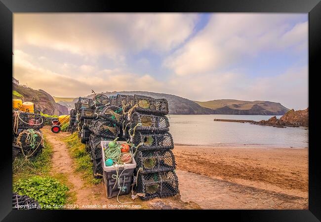 Hope Cove lobster pots  Framed Print by Ian Stone