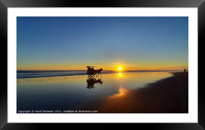 Silhouetted horse-drawn carriage beach sunset 4 Framed Mounted Print by Hanif Setiawan